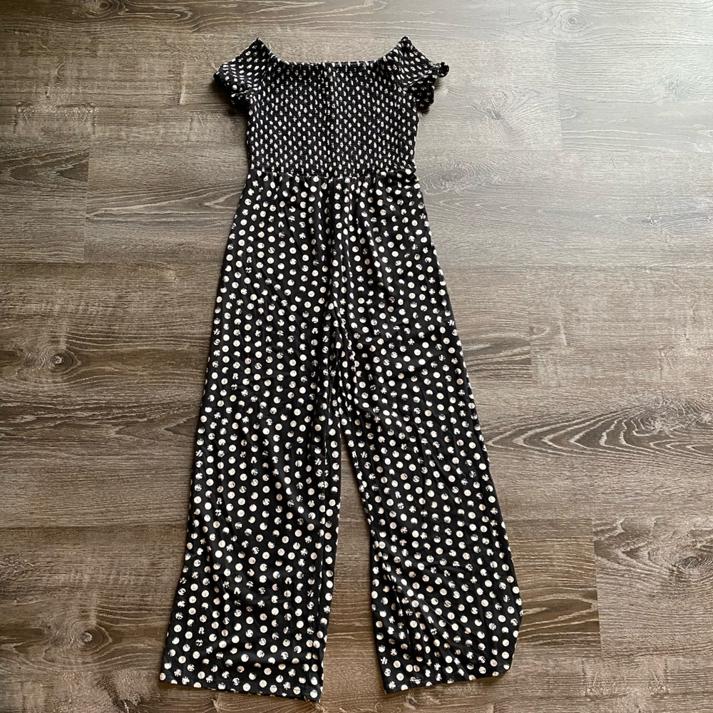 One piece with stretch material on top and baggy straight leg bottoms